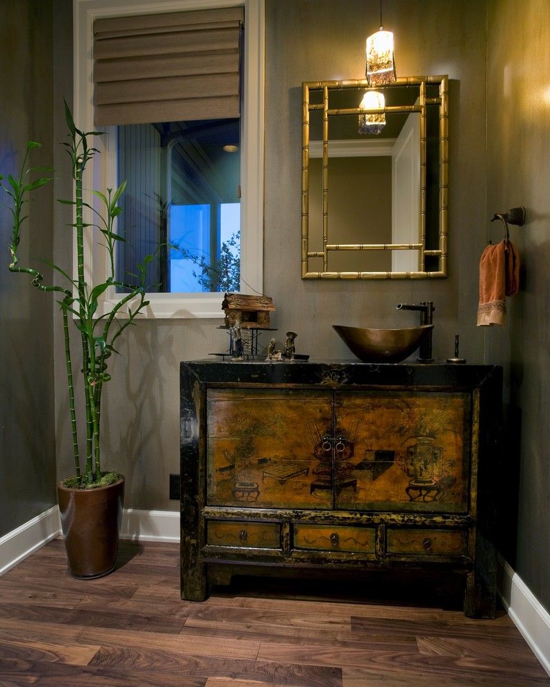 Bamboo vs Hardwood for a Contemporary Powder Room with a Baseboards and Powder Room by Kaufman Homes, Inc.