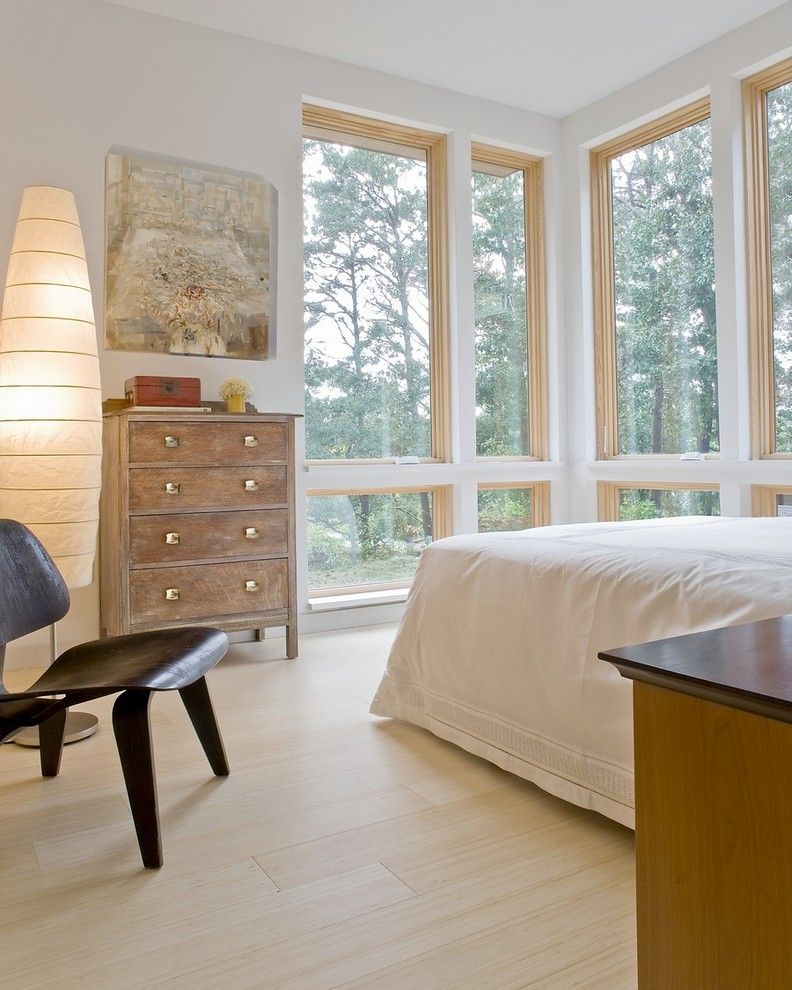 Bamboo vs Hardwood for a Modern Bedroom with a Bedroom and Guest Bedroom by Zeroenergy Design