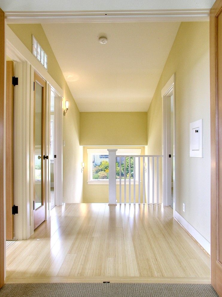 Bamboo vs Hardwood for a Traditional Hall with a Wall Lighting and Crown Hill Remodel by Neiman Taber Architects