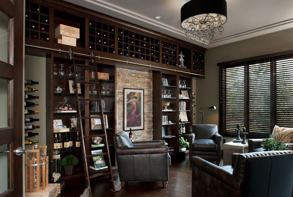 Barden Homes for a Contemporary Wine Cellar with a Black Drum Pendant Light and Kingsridge Model by Moceri Homes