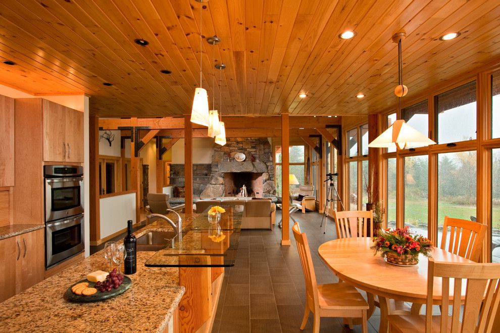 Barndominium Floor Plans for a Traditional Kitchen with a Floating Staircase and Saranac Lake House by Phinney Design Group