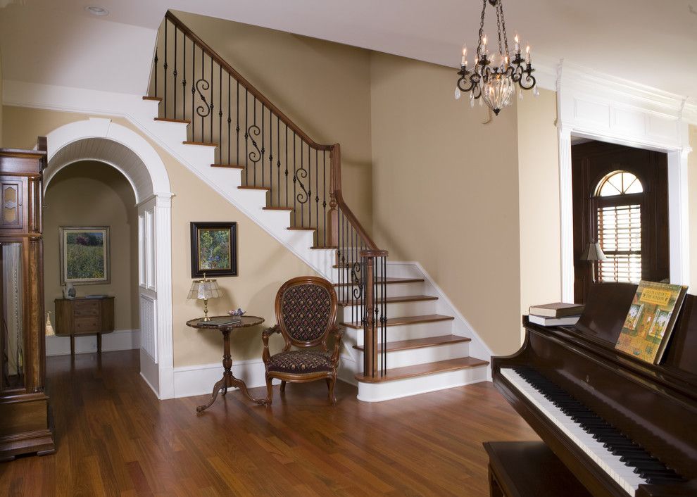 Bassett Mirror Company for a Traditional Entry with a Banister and Manning Residence Foyer and Stairway by Max Crosby Construction