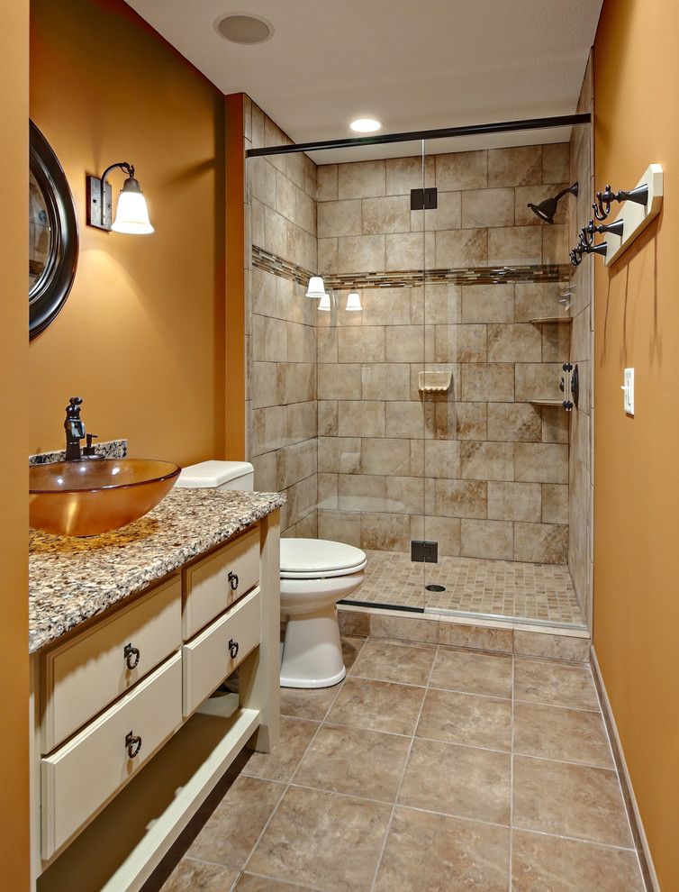 Bathroom Layouts for a Traditional Bathroom with a Golden Walls and Bathroom by Knight Construction Design Inc.