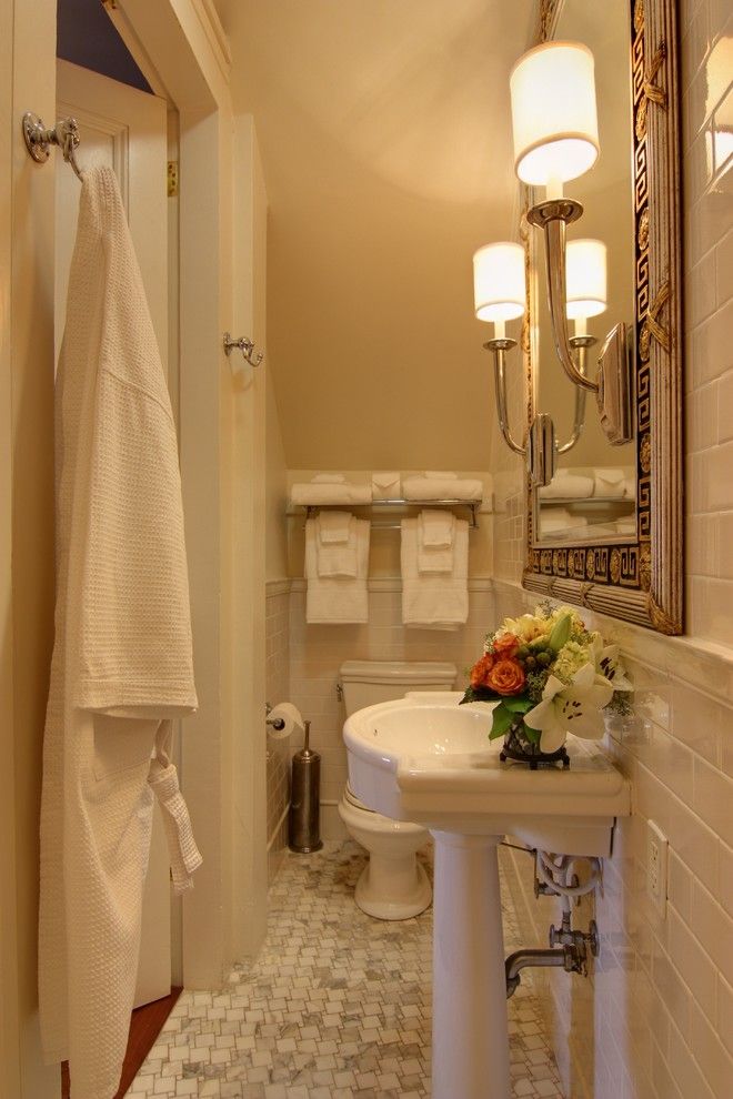 Bathroom Layouts for a Traditional Bathroom with a Marble and Closet to Bathroom Conversion by Nelson Wilson Interiors