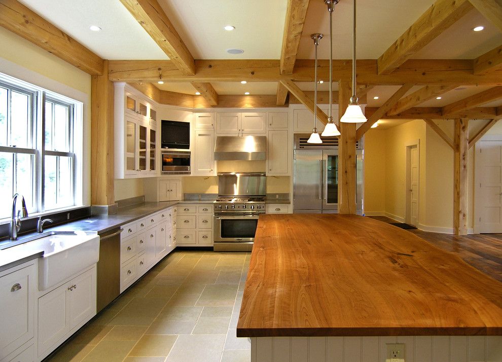 B&b Appliances for a Farmhouse Kitchen with a Glass Front Cabinets and Farmhouse Kitchen by Perkins Smith Design Build