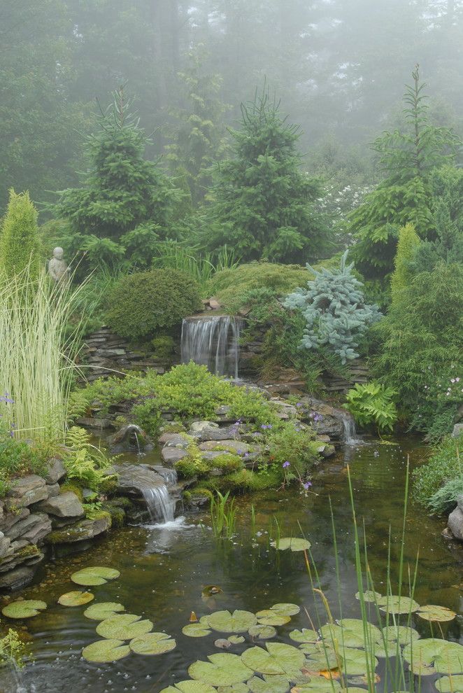 Beautiful Backyards for a Traditional Landscape with a Pond and Pocket Garden by James R. Salomon Photography