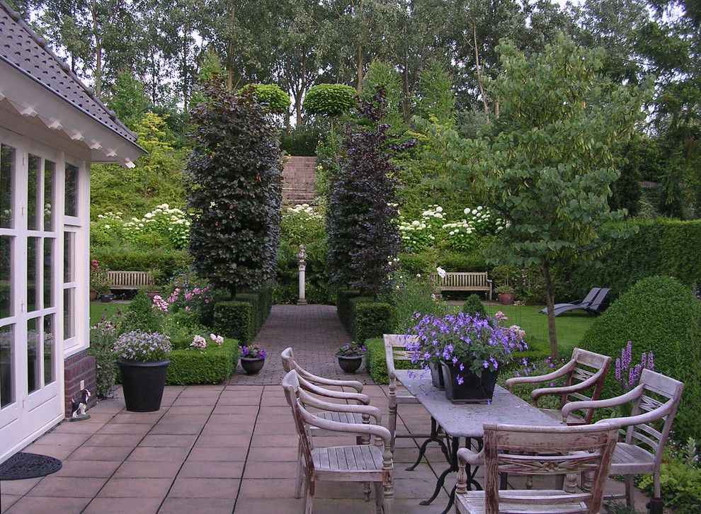 Beautiful Backyards for a Traditional Patio with a Tall Trees and Photo Courtesy of Carla and Rinus Van Lier by Houzz.com