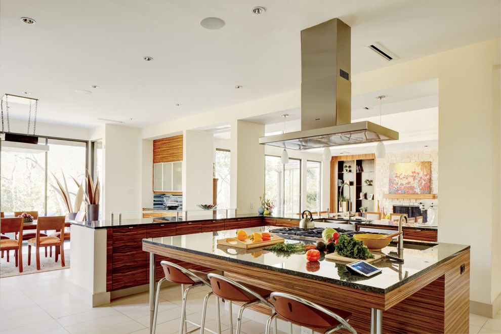 Bedrock Granite for a Modern Kitchen with a Large Kitchen Space and Kitchens by Magnolia Design Center