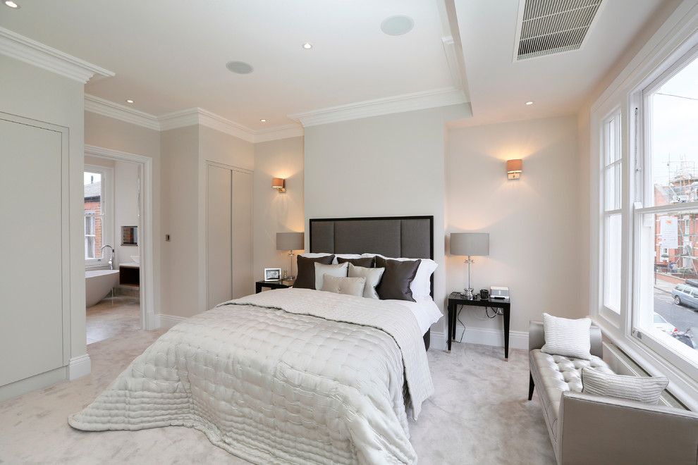 Bedroom Color Schemes for a Contemporary Bedroom with a White Crown Molding and Fulham Refurbs & Extensions by Hartley Homes