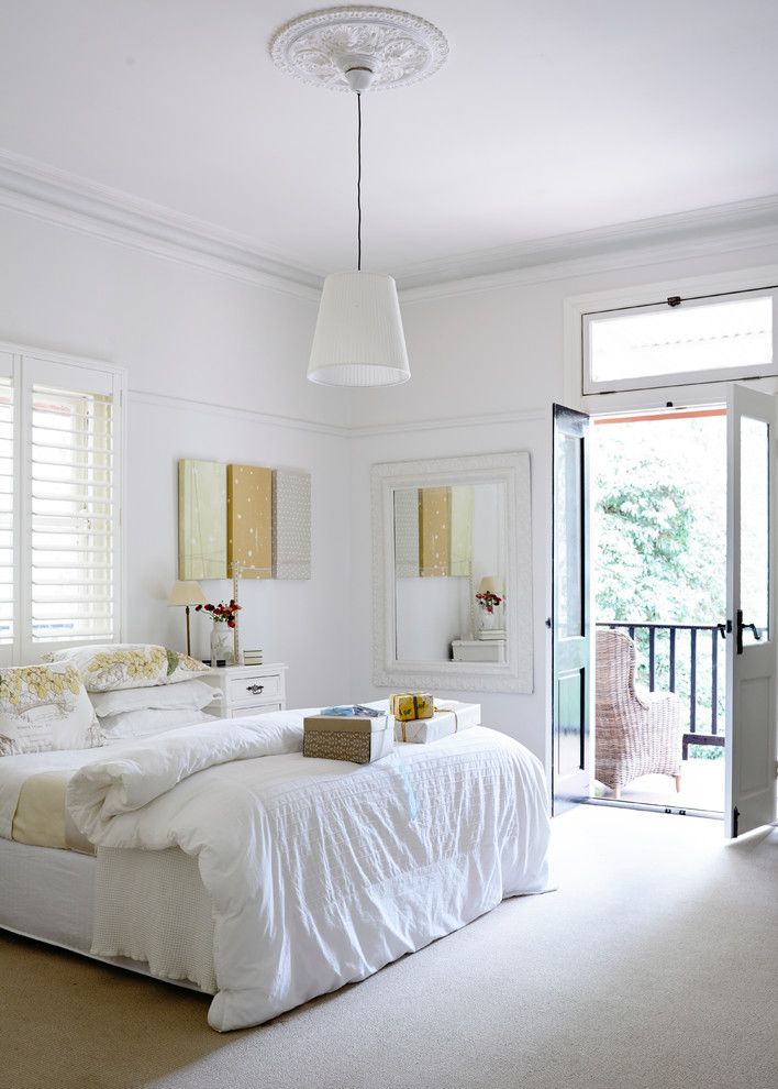 Bedroom Color Schemes for a Transitional Bedroom with a Queen Bed and Guestroom Olinda House by Beautiful South