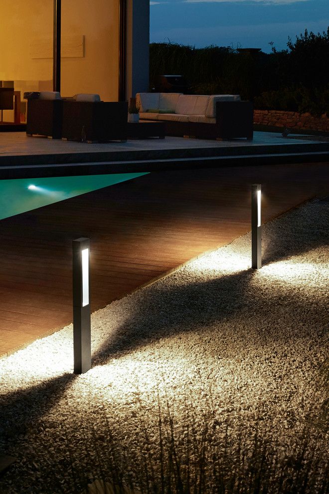 Bega Lighting for a Modern Pool with a Fixture and Landscape Lighting by Bega Us