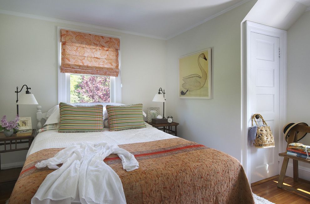 Behr Swiss Coffee for a Beach Style Bedroom with a Beach House Bedroom and Bedroom by Kate Jackson Design