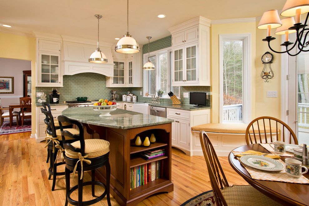 Behr Swiss Coffee for a Traditional Kitchen with a Subway Tile Backsplash and Spring Kitchen by Teakwood Builders, Inc.