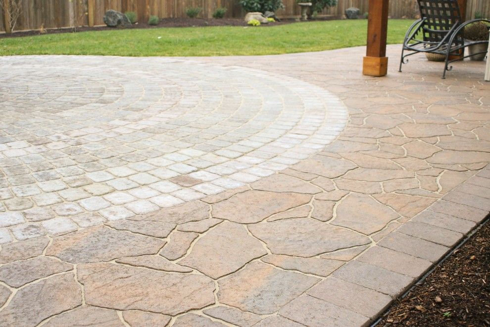 Belgard Pavers for a Craftsman Landscape with a Outdoor Hidden Storage and Belgard Arbel Paver Joined Up to a 24 Foot Wide Paver Circle. by Graham Landscape and Design