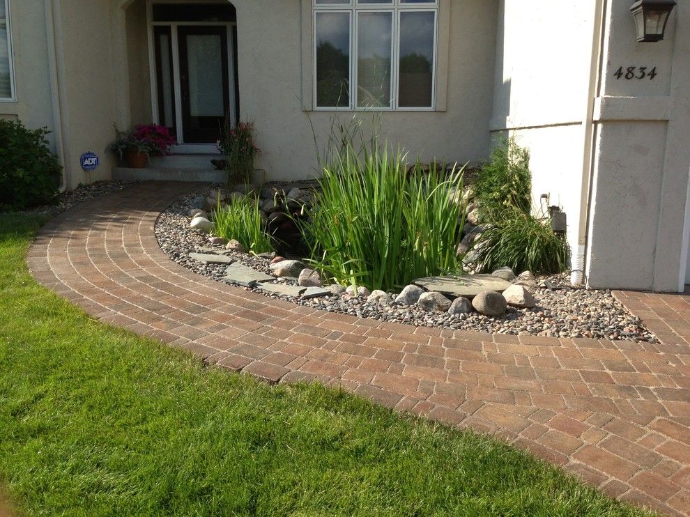 Belgard Pavers for a Traditional Entry with a Pond and Koi Pond with Belgard Paver Walkway by Backyard Paradise Landscaping Llc