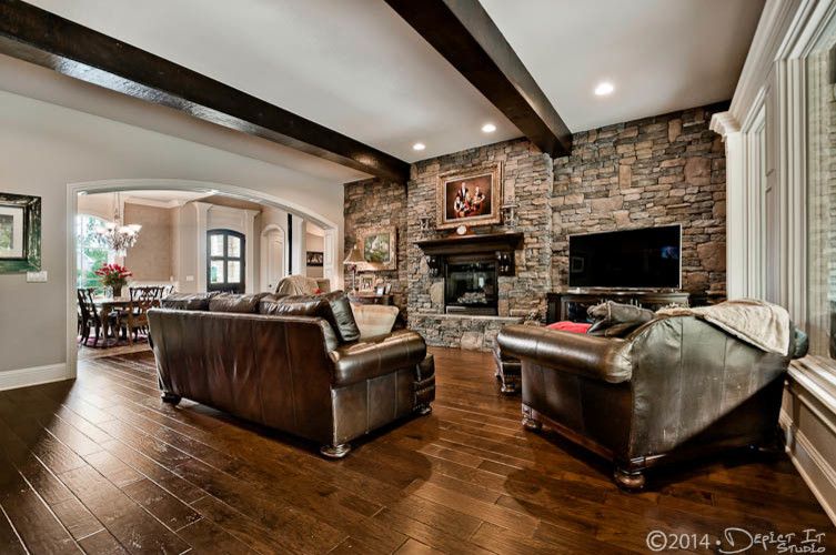 Bella Cera for a Rustic Family Room with a Homes and Sunset Ridge Home by Celtic Custom Homes