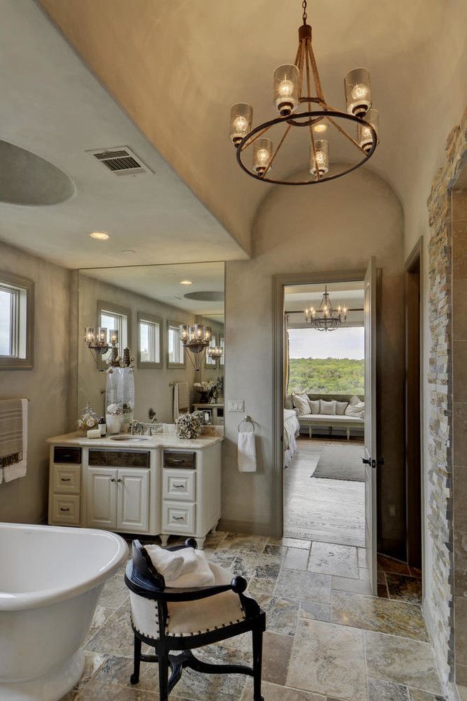 Bella Vita Custom Homes for a Mediterranean Bathroom with a Beige Floor Tile and Rough Hollow by Bella Vita Custom Homes & Remodeling