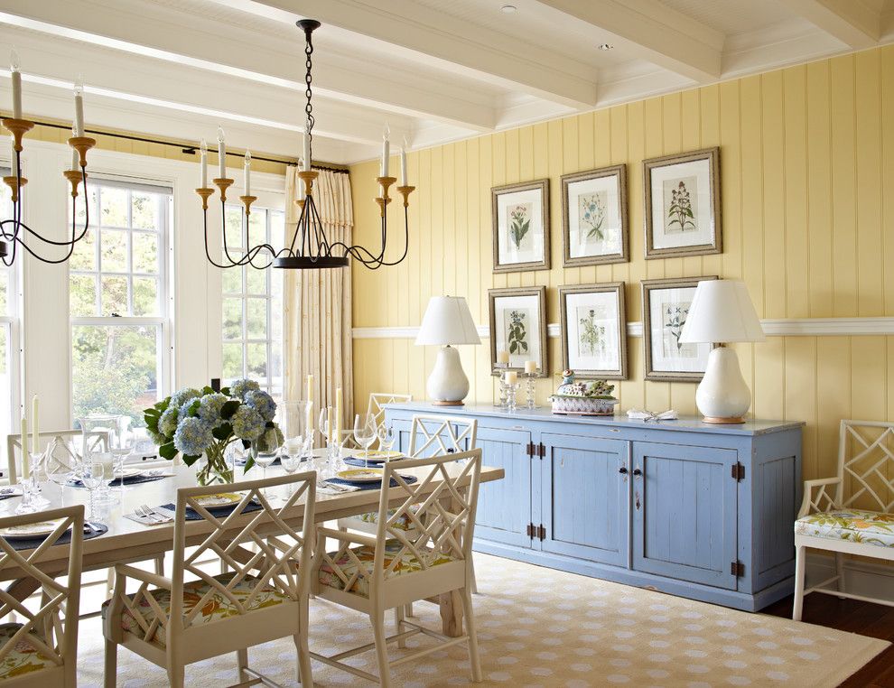 Benjamin Moore Dove White for a Beach Style Dining Room with a White Table Lamp and Michigan Summer Home by Tom Stringer Design Partners