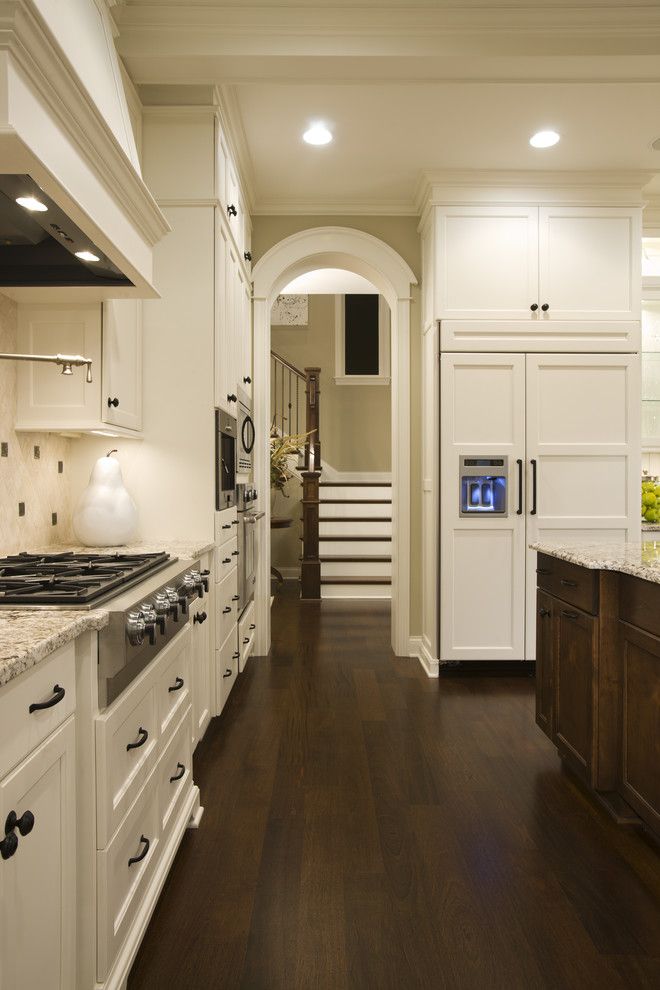 Benjamin Moore Dove White for a Traditional Kitchen with a Dark Floor and Kitchen by Stonewood, Llc