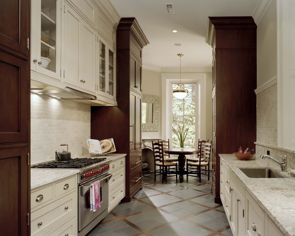 Benjamin Moore Grant Beige for a Traditional Kitchen with a Stainless Steel Appliances and Wyndmoor Residence Kitchen by Hanson Fine Building