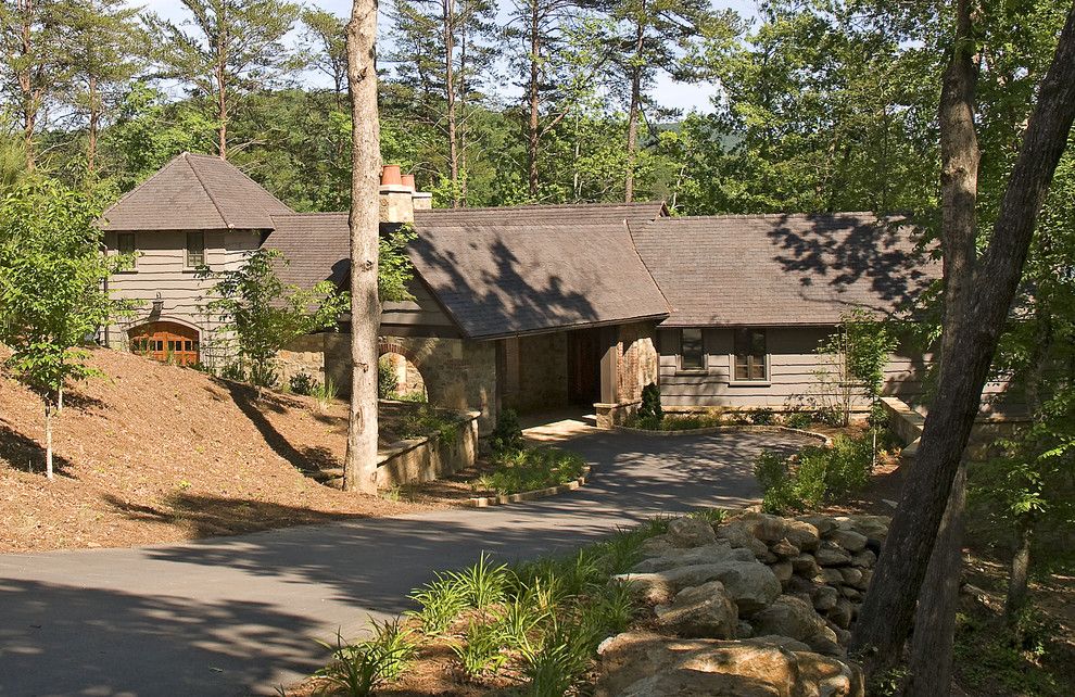 Benjamin Moore Manchester Tan for a Rustic Exterior with a Rock Wall and the Cliffs Vineyards by Summerour Architects