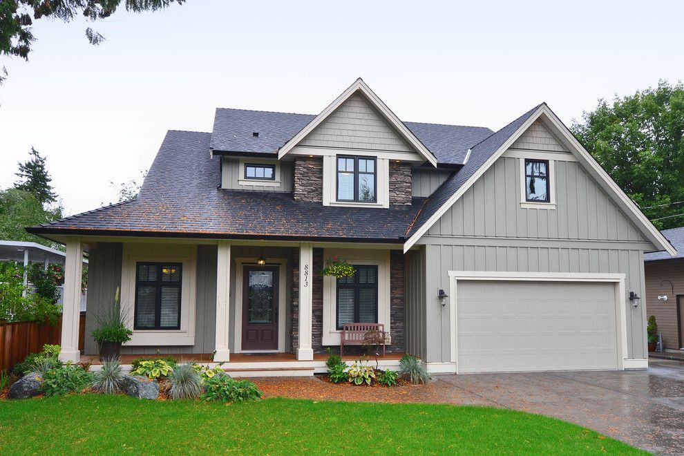 Benjamin Moore Manchester Tan for a Traditional Exterior with a Stone Siding and Fort Langley Home by F. M. Construction Ltd