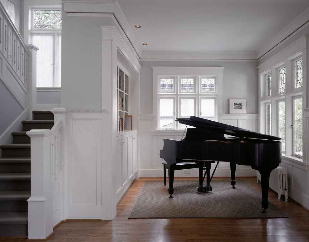 Benjamin Moore Manchester Tan for a Traditional Living Room with a Wainscot and Sheri Olson by Sheri Olson Architecture Pllc