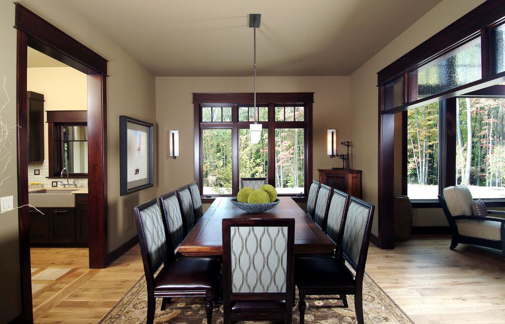 Benjamin Moore Revere Pewter Color Match for a Traditional Dining Room with a Transom Window and Dining Room by Visbeen Architects