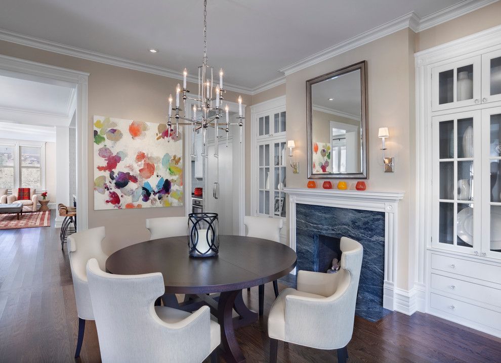 Benjamin Moore Shaker Beige for a Transitional Dining Room with a Wall Sconce and Hyde Park Renovation by Tom Stringer Design Partners