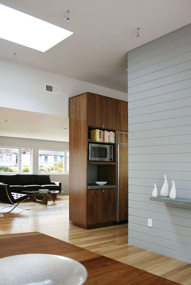 Benjamin Moore Tranquility for a Transitional Living Room with a Light Wood Floors and Martha Road Ranch House by Schwartz and Architecture