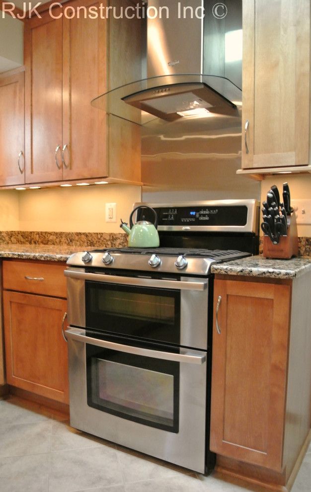 Bertch for a Traditional Kitchen with a Double Ovens and Bertch Kitchen with Sunroom by Rjk Construction Inc