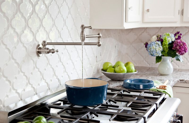 Bianco Antico Granite for a Contemporary Kitchen with a Blue and Green and White Kitchen with Bianco Antico Granite, Beveled Arabesque Tile by Karen Viscito Interiors