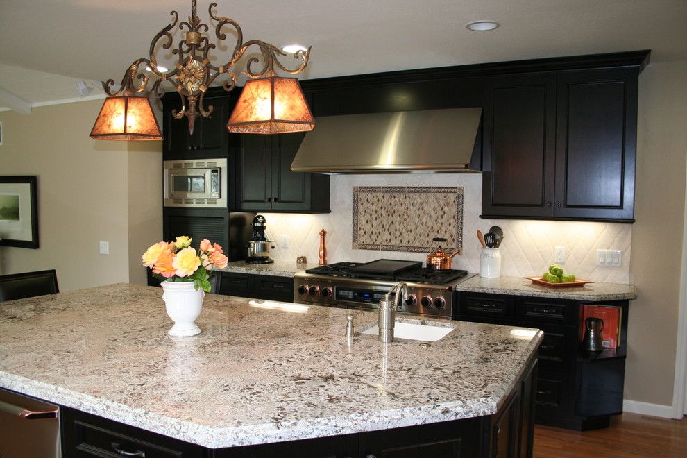 Bianco Antico Granite for a Traditional Kitchen with a Island Sink and Vannini by Kitchens of Diablo