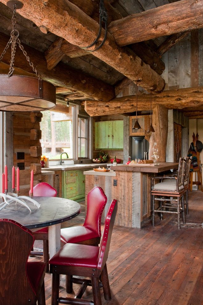 Big Sky Brokers for a Rustic Kitchen with a Dinning and Headwaters Camp Cabin, Big Sky, Montana by Dan Joseph Architects, Llc