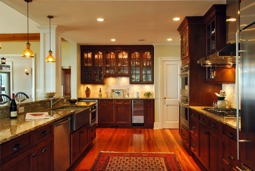 Bill Smith Appliances for a Traditional Kitchen with a Dark Stained Wood Cabinetry and Kitchen by Phillip W Smith General Contractor, Inc.