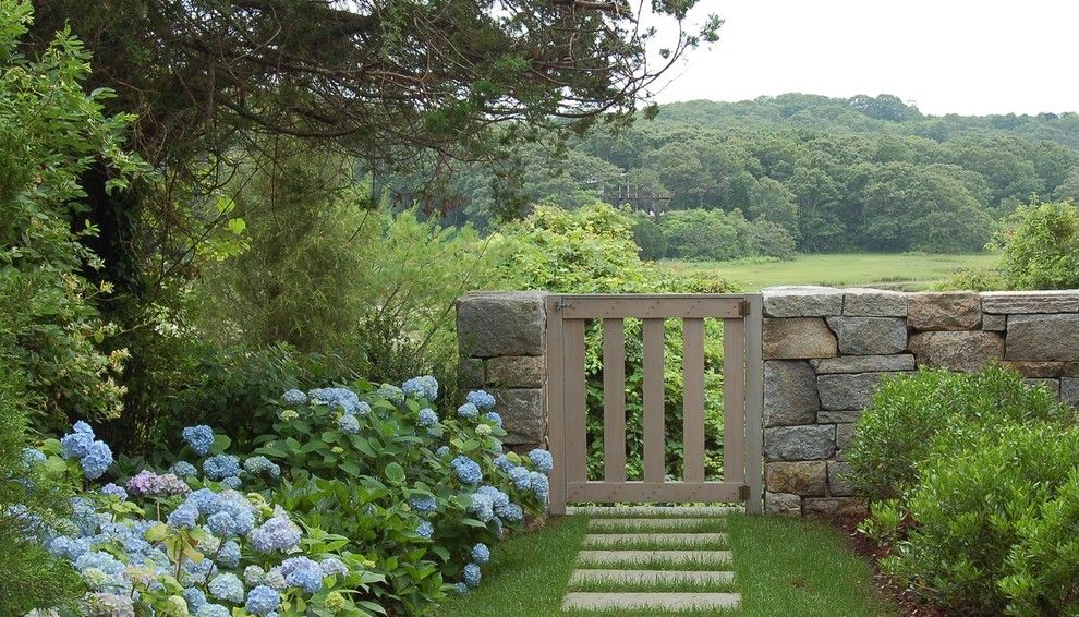 Billows Electric for a Traditional Landscape with a Cottage Garden and New England Fieldstone Wall and Gate on Cape Cod by Kimberly Mercurio Landscape Architecture