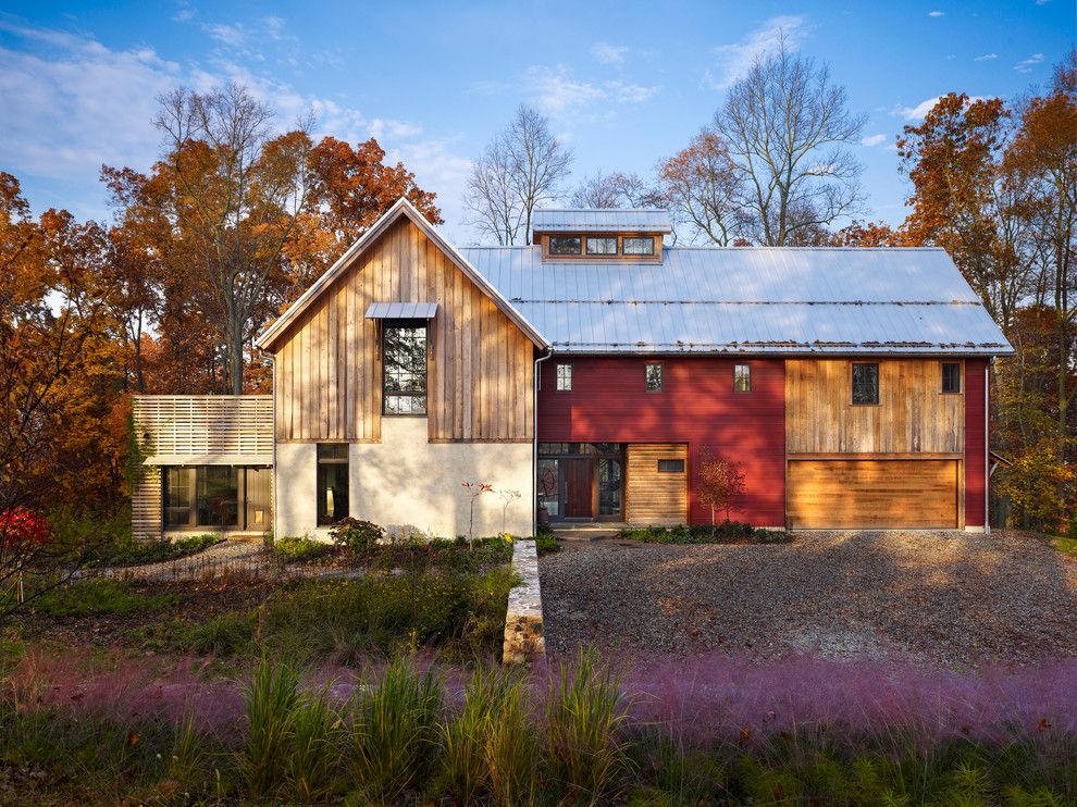 Bison Building Materials for a Farmhouse Exterior with a Grasses and Bragg Hill by Moger Mehrhof Architects