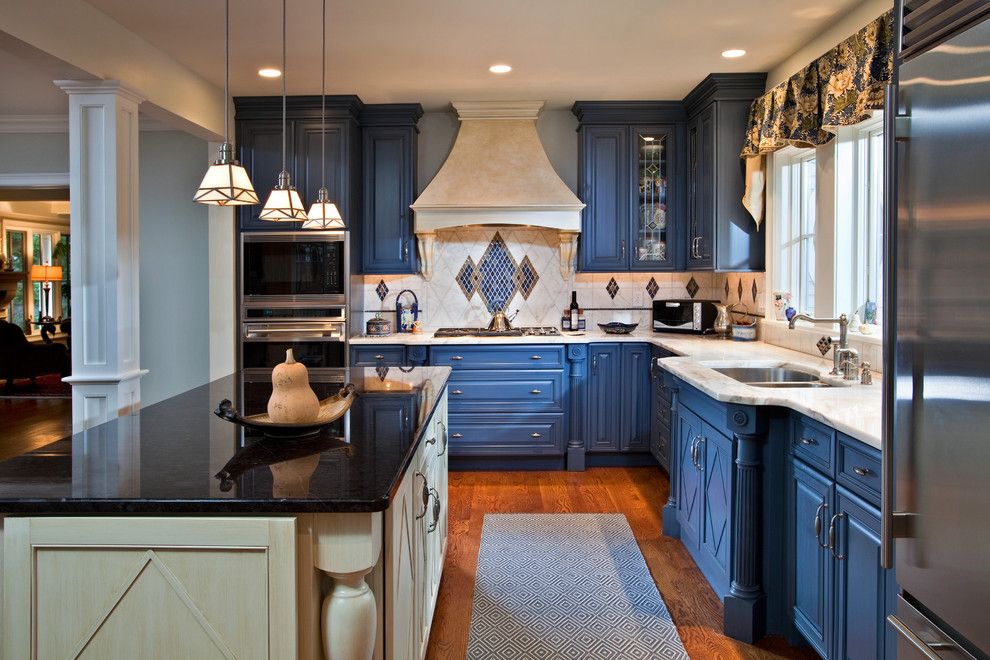 Blackened Steel for a Eclectic Kitchen with a Blue Cabinets and Colorful Kitchen in Saratoga Springs Ny by Teakwood Builders, Inc.