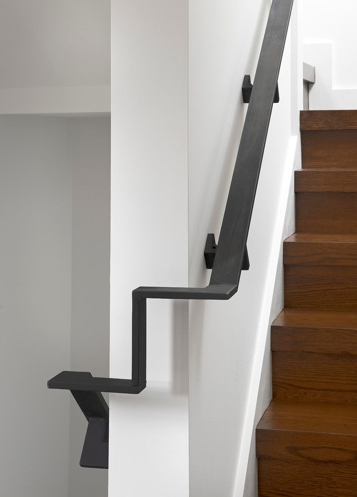 Blackened Steel for a Eclectic Staircase with a Handrail and Asbury Residence by Searl Lamaster Howe Architects