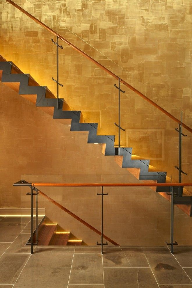 Blackened Steel for a Modern Staircase with a Stone Tile and Lake House Two   Stair by Mcclellan Architects