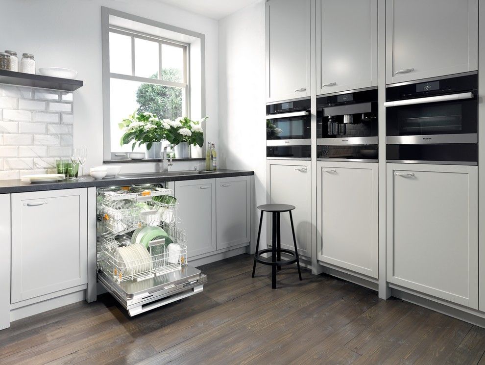 Blackhawk Hardware for a Modern Kitchen with a Black Stool and Miele by Miele Appliance Inc