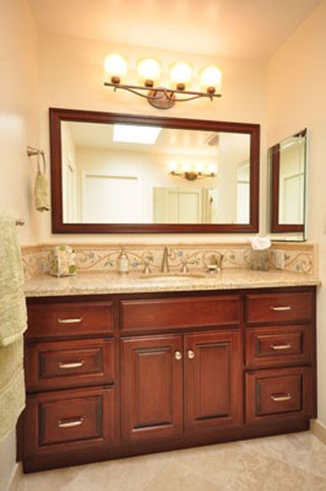 Blackhawk Hardware for a Traditional Bathroom with a Orinda and Silverwood by Stonewood Kitchen and Bath