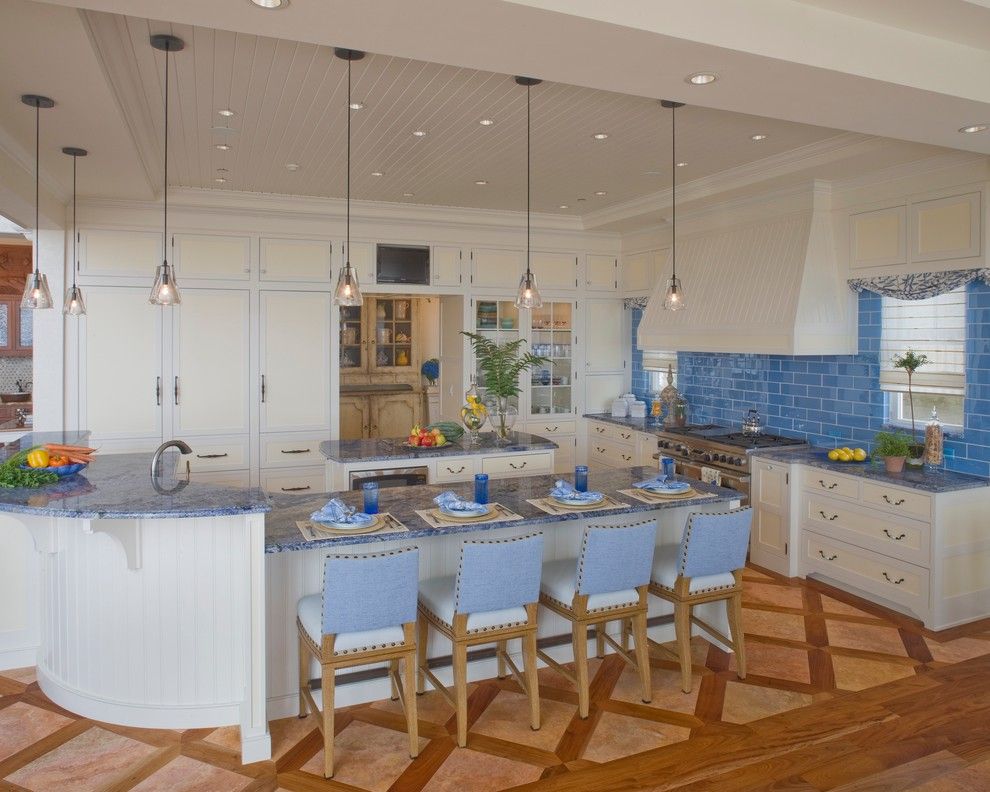 Blue Bahia Granite for a Beach Style Kitchen with a White Kitchen and Waterfront Retreat by Bruce Palmer Interior Design