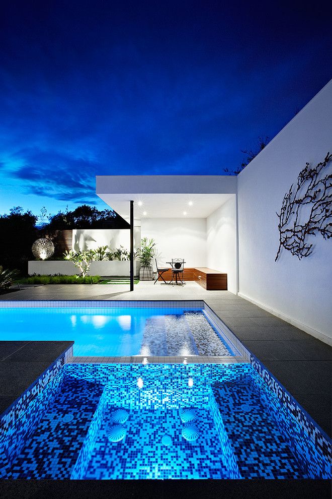 Blue Hawaiian Pools for a Contemporary Exterior with a Modern Backyard and Ddb Design Exteriors & Pools by Ddb Design Development & Building