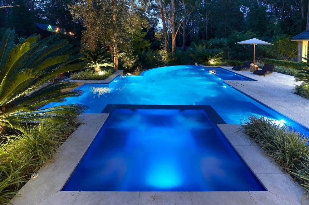 Blue Hawaiian Pools for a Contemporary Pool with a Umbrella and Hidden Valley by Dean Herald Rolling Stone Landscapes