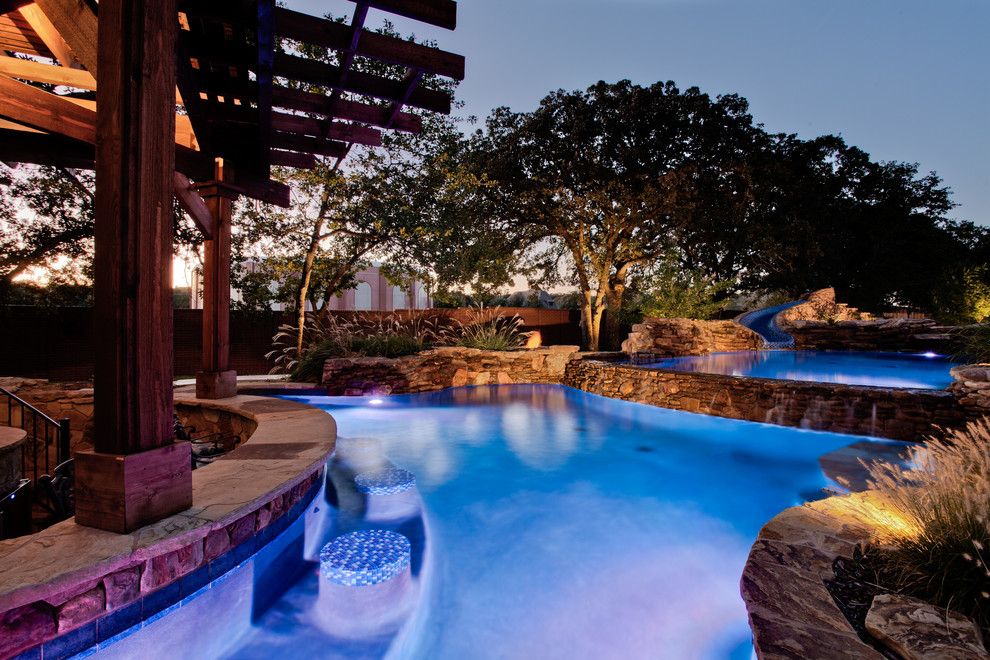 Blue Hawaiian Pools for a Tropical Pool with a Wood Beam and Open Water   Southlake, Tx by One Specialty Landscape Design, Pools & Hardscape