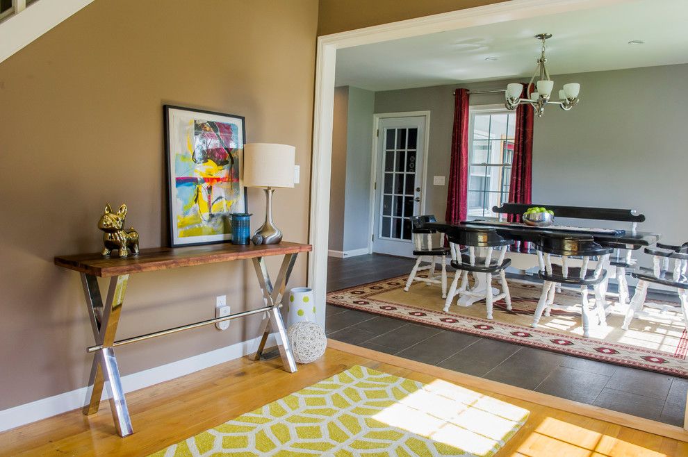 Bo Concept for a Modern Dining Room with a Red Accents and Troy Residence by Bespoke Decor