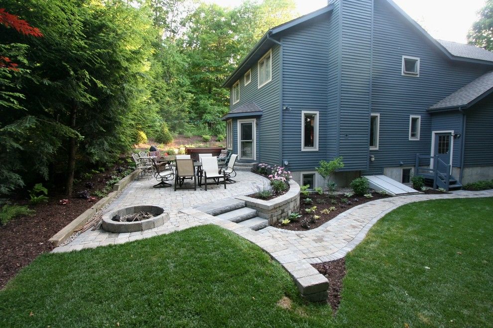 Bocce Ball Court for a Modern Landscape with a Paver Patios and Country Home Entrance and Patio by Perennial Landscaping