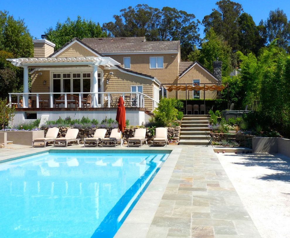 Bocce Ball Court for a Traditional Pool with a Outdoor Stairs and Pool and Sun Shades at Dining Terrace Remodel by Mad Architecture