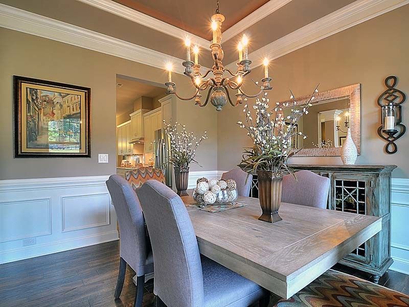 Bonterra Builders for a Traditional Dining Room with a Wood Table and Interiors by Bonterra Builders